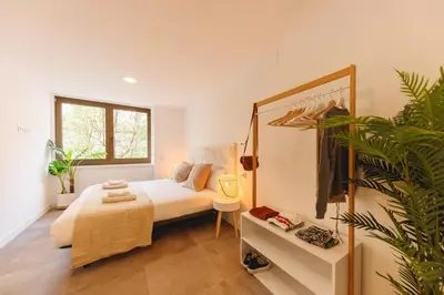 Cama o camas de una habitación en Bravissimo Turbau Entresol B, with 3 bedrooms