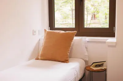 Cama o camas de una habitación en Bravissimo Turbau Entresol A, with 3 bedrooms