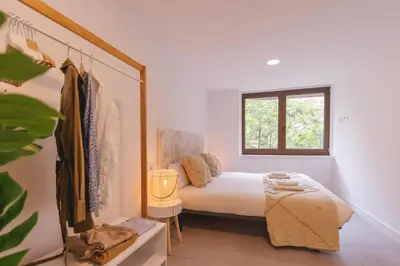 Cama o camas de una habitación en Bravissimo Turbau Entresol A, with 3 bedrooms
