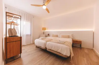 Cama o camas de una habitación en Bravissimo Maragall, very spacious and central