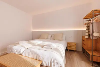 Cama o camas de una habitación en Bravissimo Maragall, very spacious and central