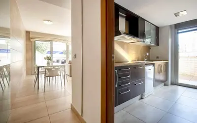 Una cocina o zona de cocina en Voramar – A 50 m de la Playa, Parking y A/A
