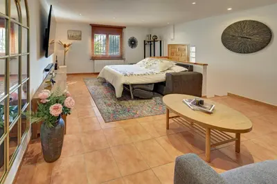 Cama o camas de una habitación en VILLA ARBUCIES with private pool