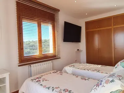 Cama o camas de una habitación en VILLA ARBUCIES with private pool