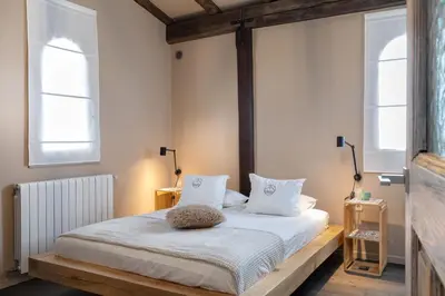 Cama o camas de una habitación en La Capella Costa Brava - By EMERALD STAY