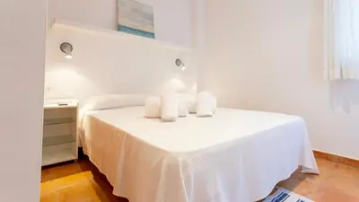 Cama o camas de una habitación en CANADELL BLOC B baixos 1ª