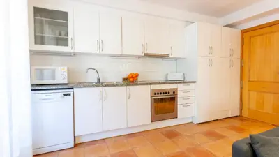 Una cocina o zona de cocina en CANADELL BLOC B baixos 1ª
