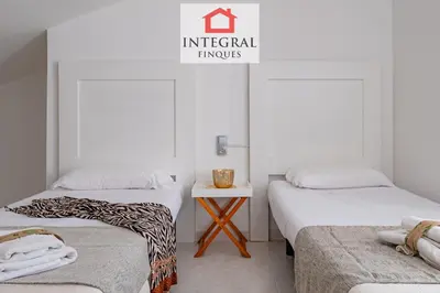 Cama o camas de una habitación en La Perla del Mar - Casa la Fosca