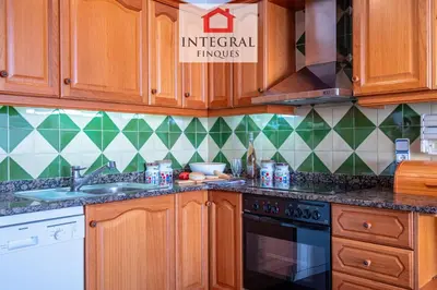 Una cocina o zona de cocina en Miramar Apartament Palamós