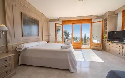 Cama o camas de una habitación en Casa de 2000 m2 Piscina Mar Barbacoa y Felicidad