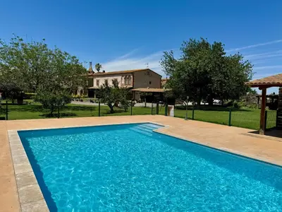 Piscina en o cerca de Can Pujol - Casitas de Turismo Rural en el Baix Empordà