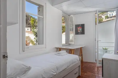 Cama o camas de una habitación en Flateli Sa Tuna Apt 2
