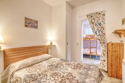 Cama o camas de una habitación en Bonita Planta baja muy céntrica con Parking