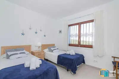 Cama o camas de una habitación en Villa Inge en Platja d'Aro