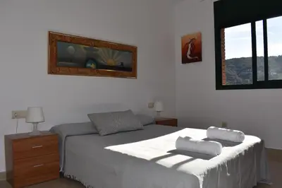 Cama o camas de una habitación en Cal Nene - plamun es