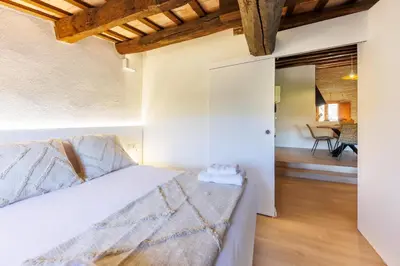 Cama o camas de una habitación en Bravissimo Calderes El Bou, with river view