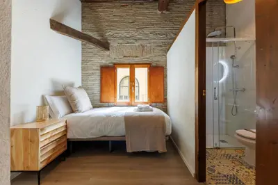Cama o camas de una habitación en Bravissimo Calderes El Bou, with river view