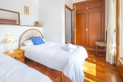 Cama o camas de una habitación en Acogedora casa con piscina en Sant Antoni Calonge