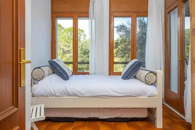 Cama o camas de una habitación en Acogedora casa con piscina en Sant Antoni Calonge