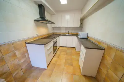 Una cocina o zona de cocina en HomeHolidaysRentals Anais - Costa Barcelona