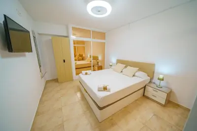 Cama o camas de una habitación en HomeHolidaysRentals Anais - Costa Barcelona