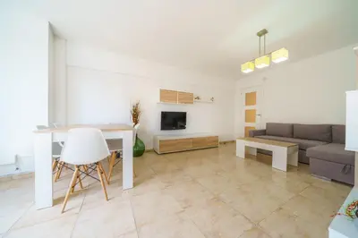 Una televisión o centro de entretenimiento en HomeHolidaysRentals Anais - Costa Barcelona