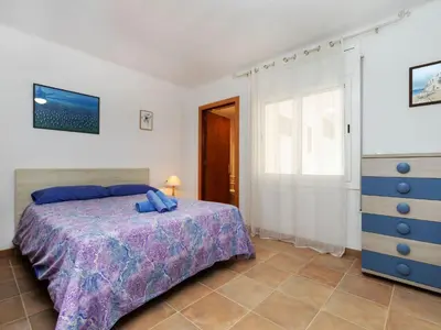 Cama o camas de una habitación en Holiday Home Can Can Grau by Interhome