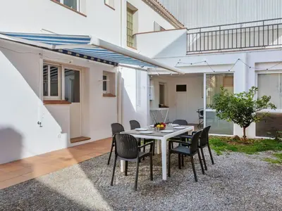 Un patio o zona al aire libre en Holiday Home Can Can Grau by Interhome