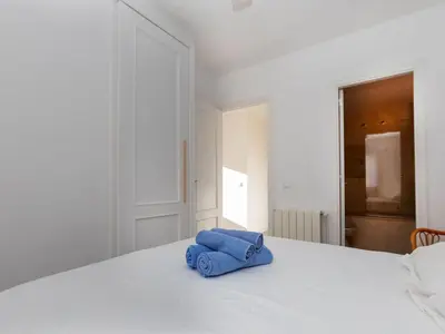 Cama o camas de una habitación en Apartment Jardins de S'Agaro by Interhome