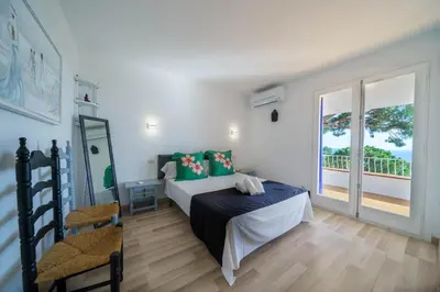 Cama o camas de una habitación en Villa Sea Breeze Vista Mar Piscina Privada Aire Acondicionado