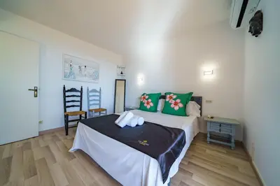 Cama o camas de una habitación en Villa Sea Breeze Vista Mar Piscina Privada Aire Acondicionado