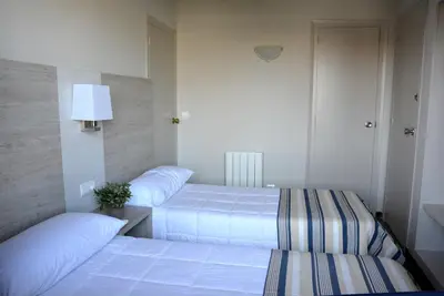 Cama o camas de una habitación en Apartaments la Catifa now with ELEVATOR!!!