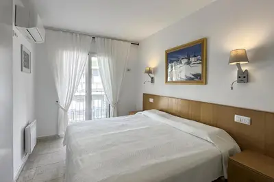 Cama o camas de una habitación en LETS HOLIDAYS Big Apartment With Parking