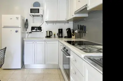 Una cocina o zona de cocina en LETS HOLIDAYS Big Apartment With Parking
