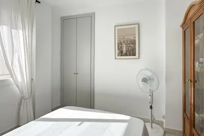 Cama o camas de una habitación en LETS HOLIDAYS Big Apartment With Parking