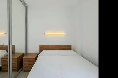 Cama o camas de una habitación en LETS HOLIDAYS Big Apartment With Parking