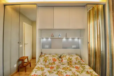 Cama o camas de una habitación en Apartment Columbo