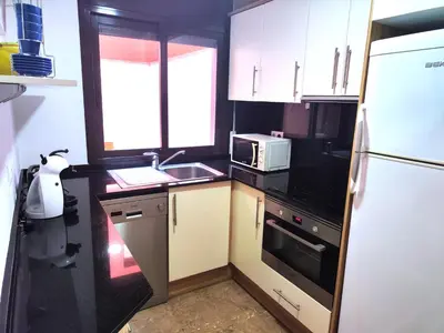 Una cocina o zona de cocina en Apartamento a 150m de la playa