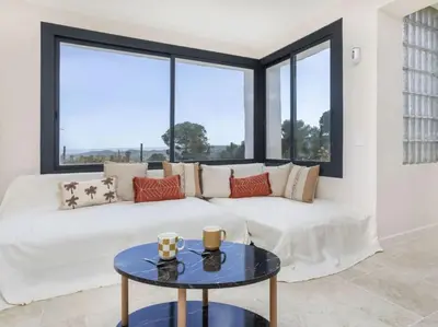 Zona de estar de Panoramic views and pool in Villa del Alba