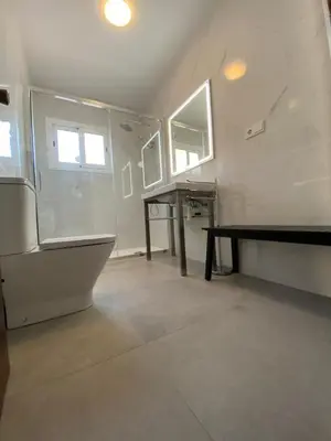 Un baño de Casa con vistas al mar y piscina privada