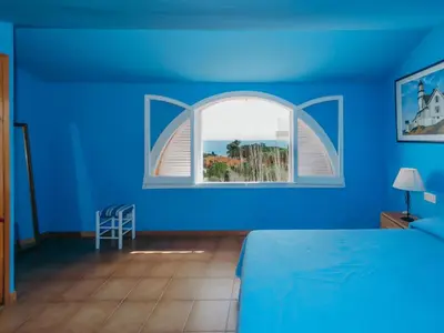 Cama o camas de una habitación en La Fosca Jolie