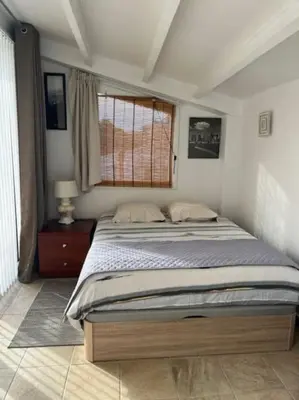 Cama o camas de una habitación en T2 climatisé + parking 500 m plage/centre ville
