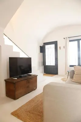 Una televisión o centro de entretenimiento en Maram Brava casa centro Begur Metge Pi