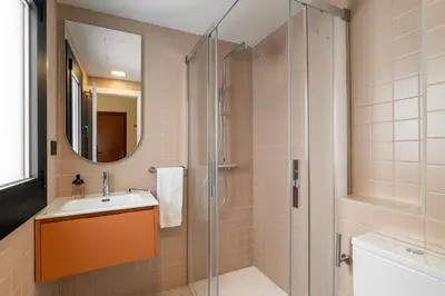 Un baño de Hotel Robson - Smart Hotel