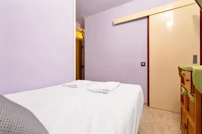 Cama o camas de una habitación en WELCS APARTAMENTO 126 PDA cerca del puerto