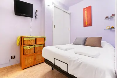Cama o camas de una habitación en WELCS APARTAMENTO 126 PDA cerca del puerto