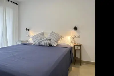 Cama o camas de una habitación en LETS HOLIDAYS Cozy apartment near beach Tossa 2