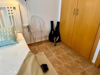 Cama o camas de una habitación en Apartament reformat, Wi Fi, parking, piscina, AC