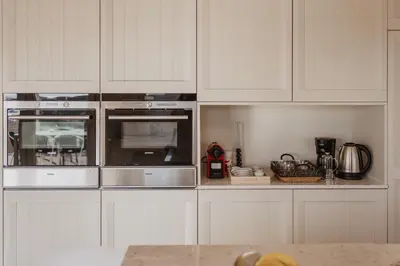 Una cocina o zona de cocina en Petit Luxe Pineda