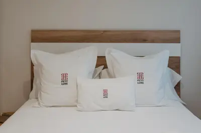 Cama o camas de una habitación en Petit Luxe Pineda